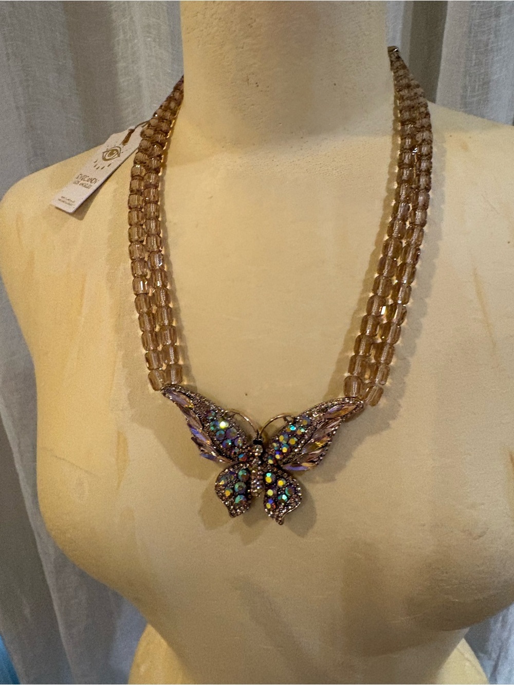 eye candy Taupe Beaded Necklace with Iridescent Butterfly Pendant